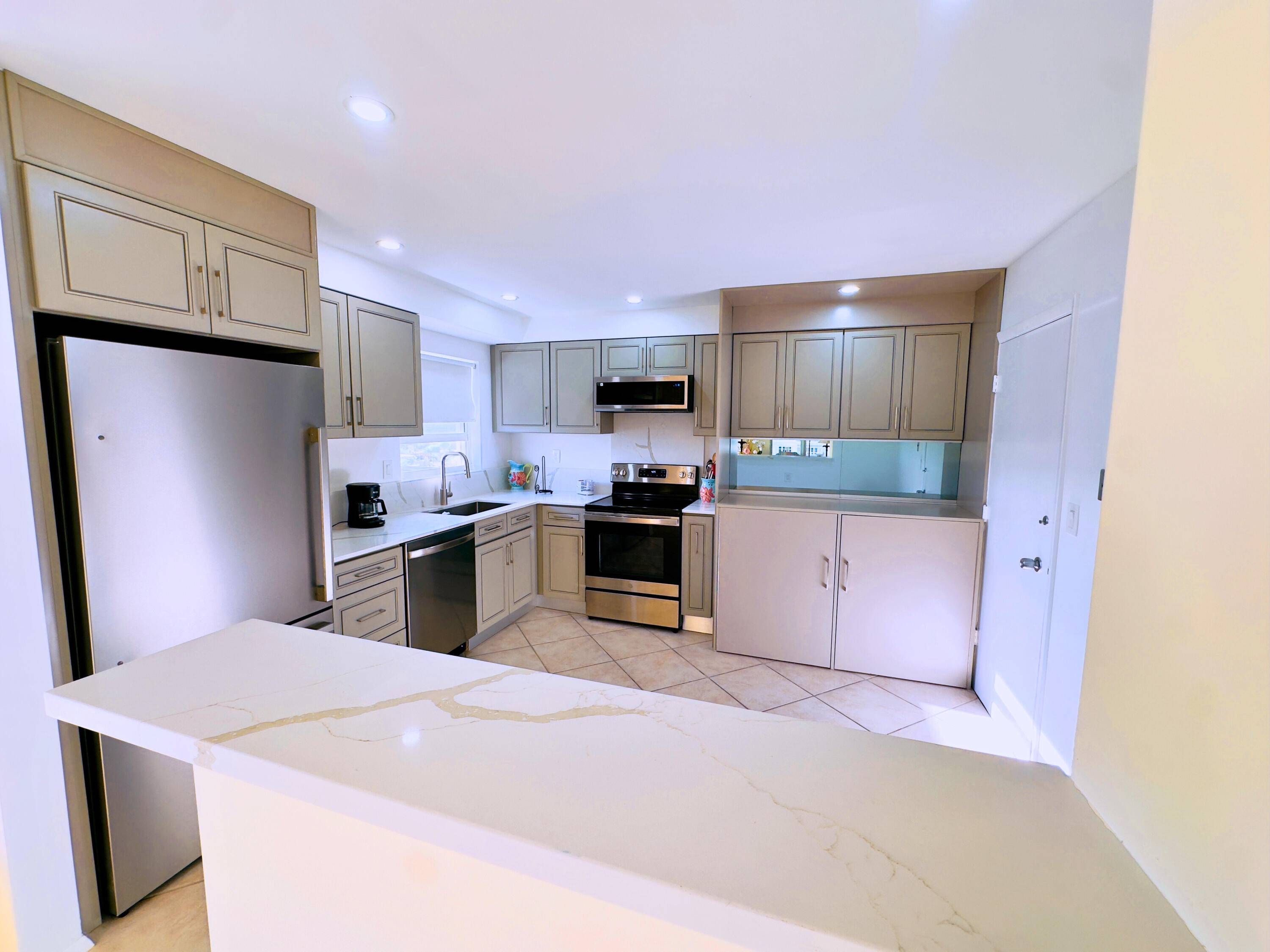 Experience breathtaking ocean, Intracoastal, and city views from this spacious southwest corner 2BR 2BA condo in Regency Tower.