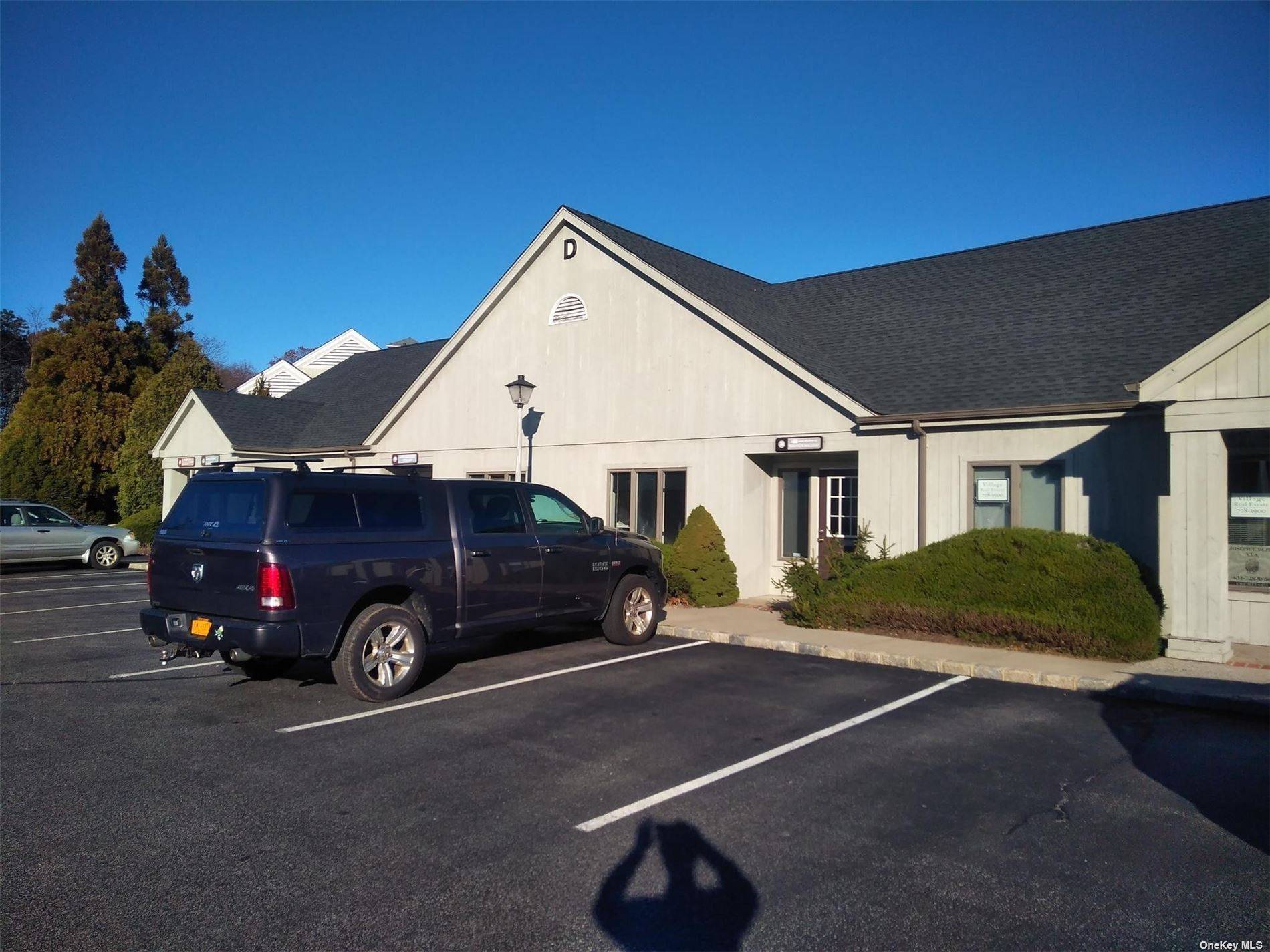 Beautifully renovated office condominium unit, large, modern open floor plan with three desks, separate conference room and half bath.