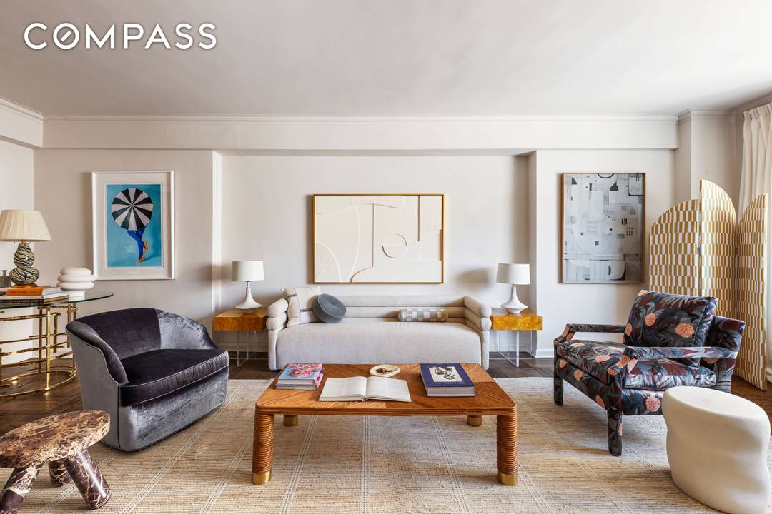 Experience the spacious elegance of this sunlit three bedroom, three full bathroom home, ideally situated on prestigious Fifth Avenue, just steps from Central Park.