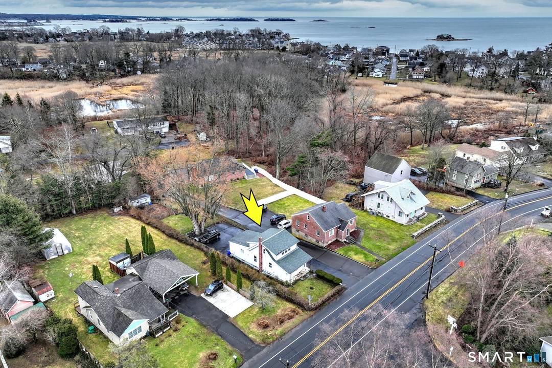 Nestled in the desirable Indian Neck section of Branford, this charming and well loved 1920s bungalow offers the perfect blend of character, space, and shoreline lifestyle.