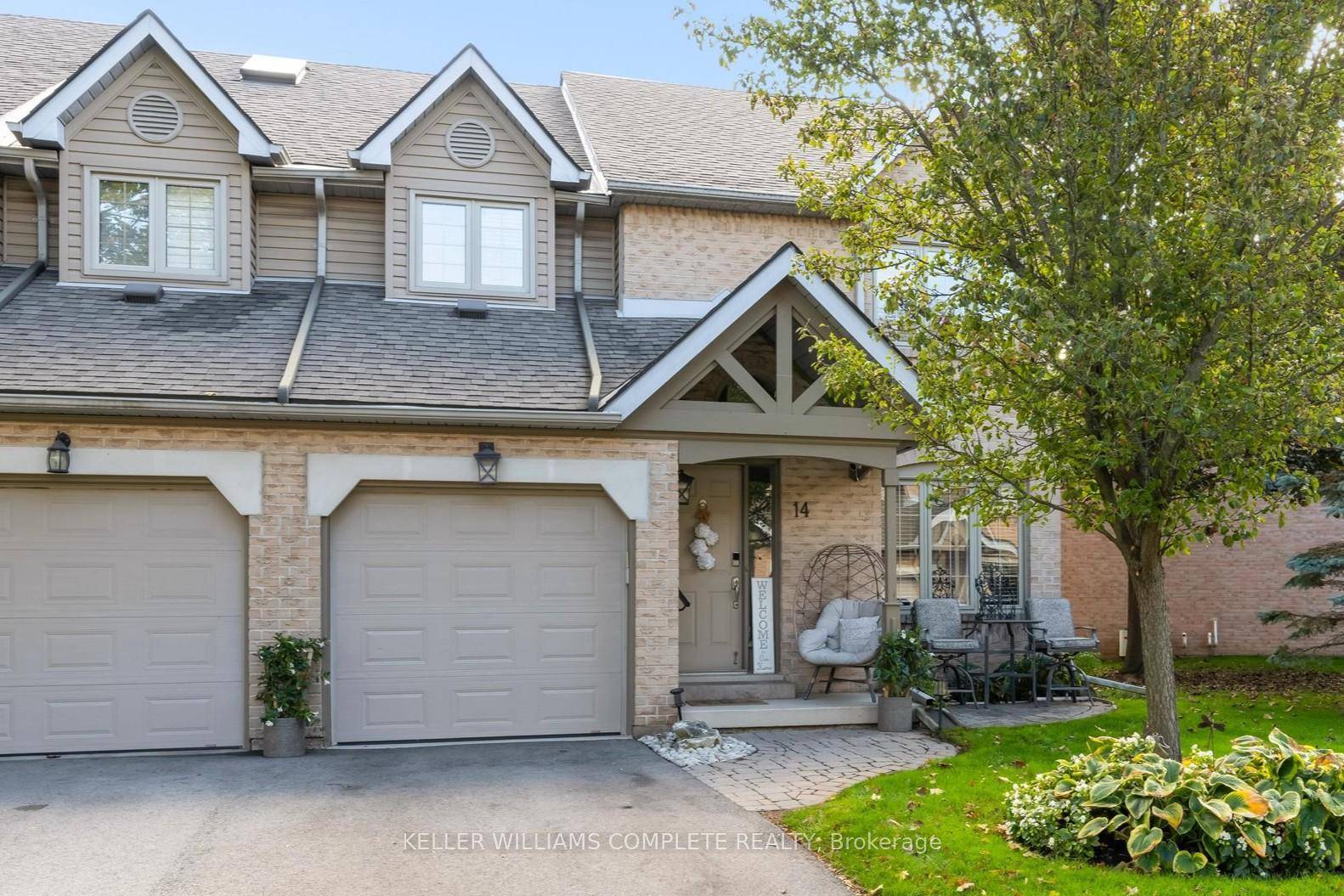 Welcome to this beautifully maintained end unit townhome in an exclusive enclave, the only one with side windows allowing for abundant natural light.