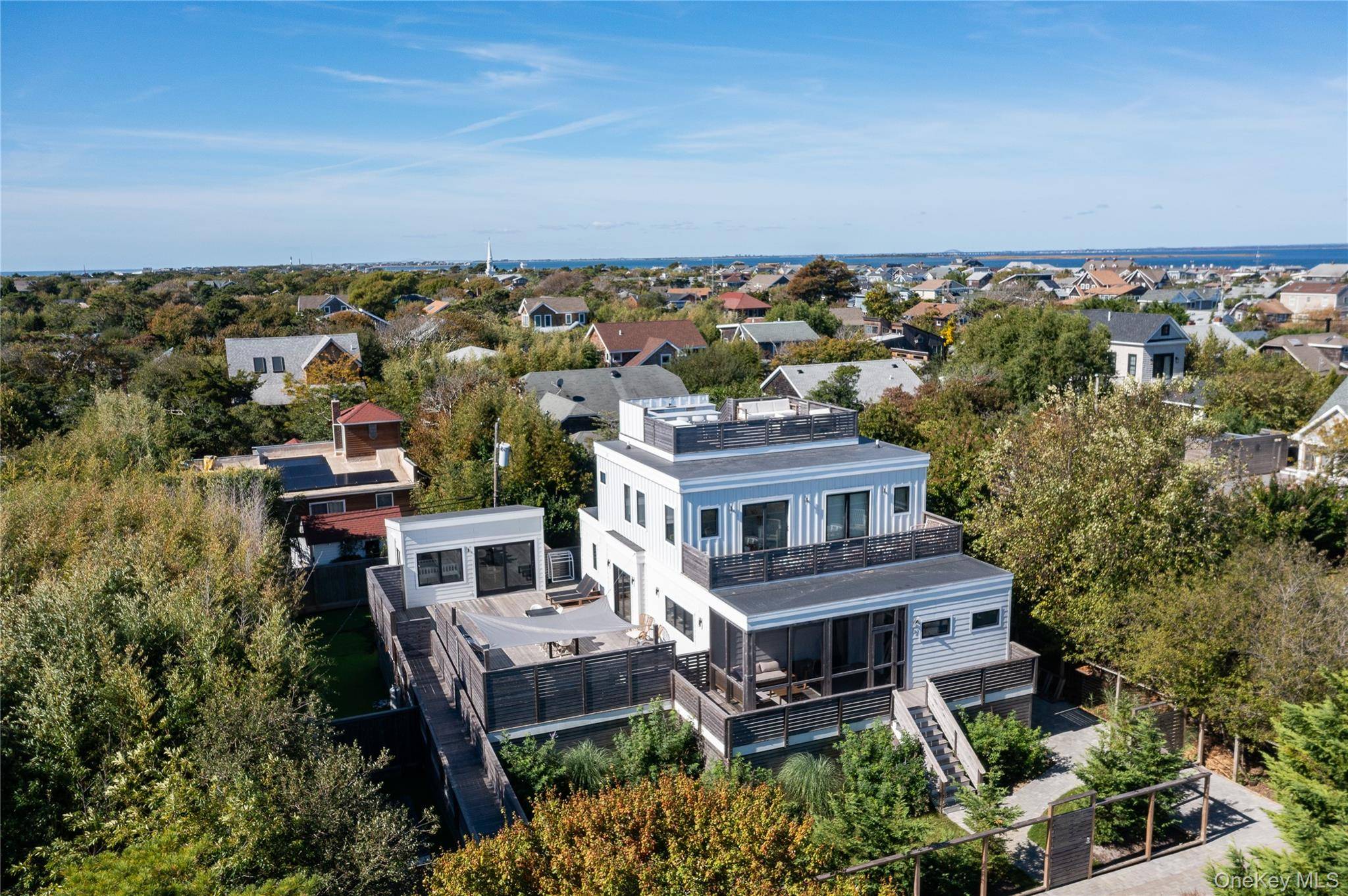 Welcome to your dream coastal escape in Seaview, Fire Island, a picturesque beachside village, where laid back luxury meets timeless charm.