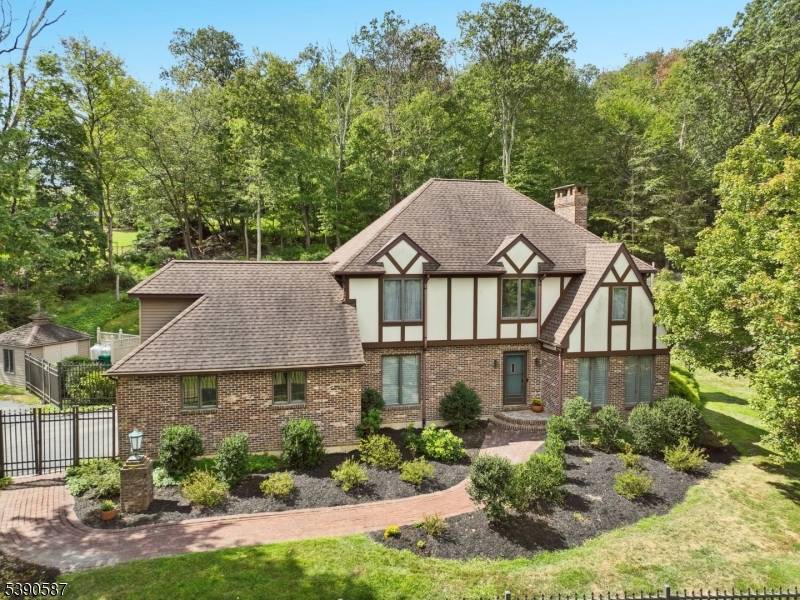 Welcome to this beautifully appointed colonial home, nestled in a serene setting with breathtaking countryside views.