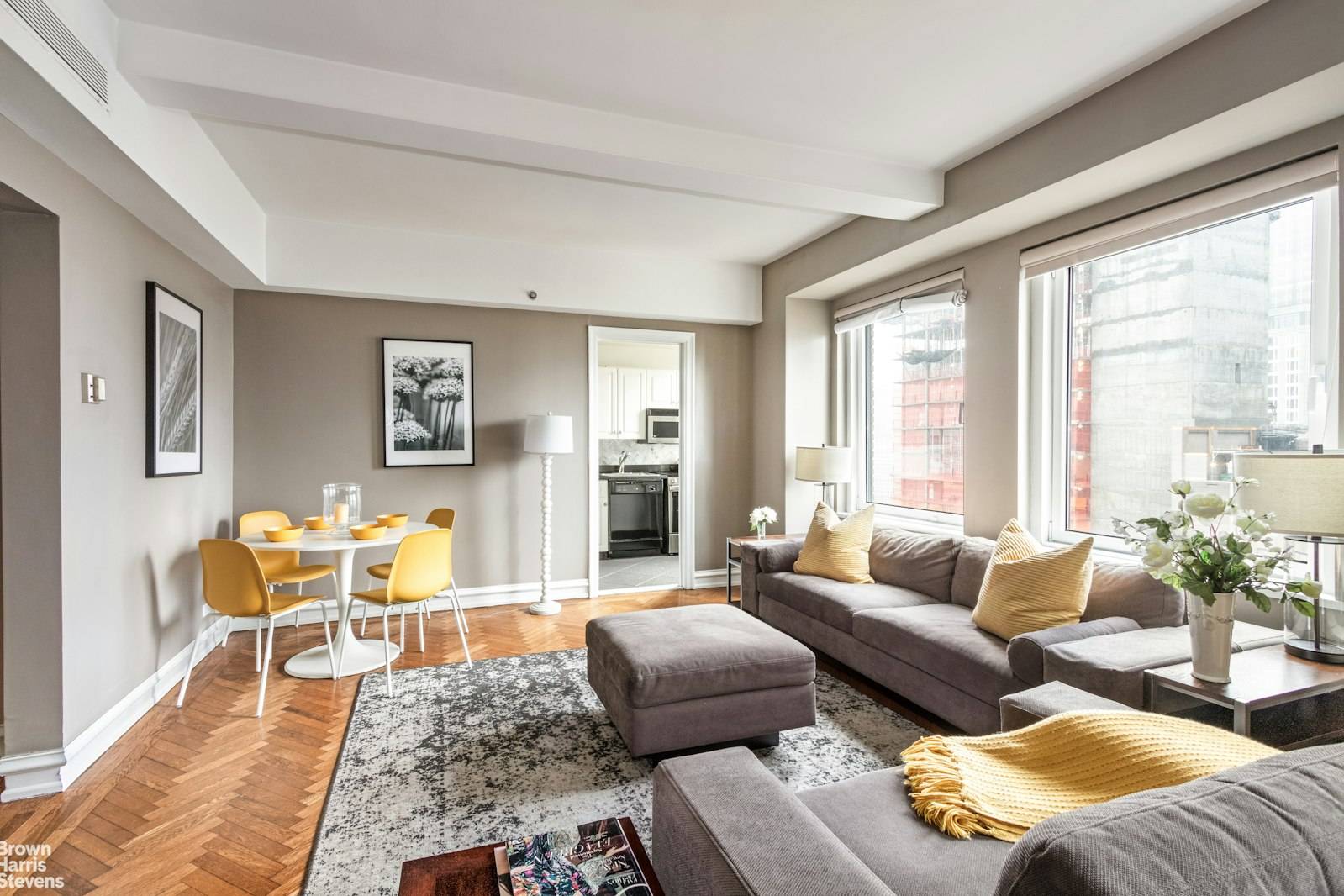 Upon entering the home, a spacious foyer draws you in, flowing directly into the sprawling open concept living and dining area.