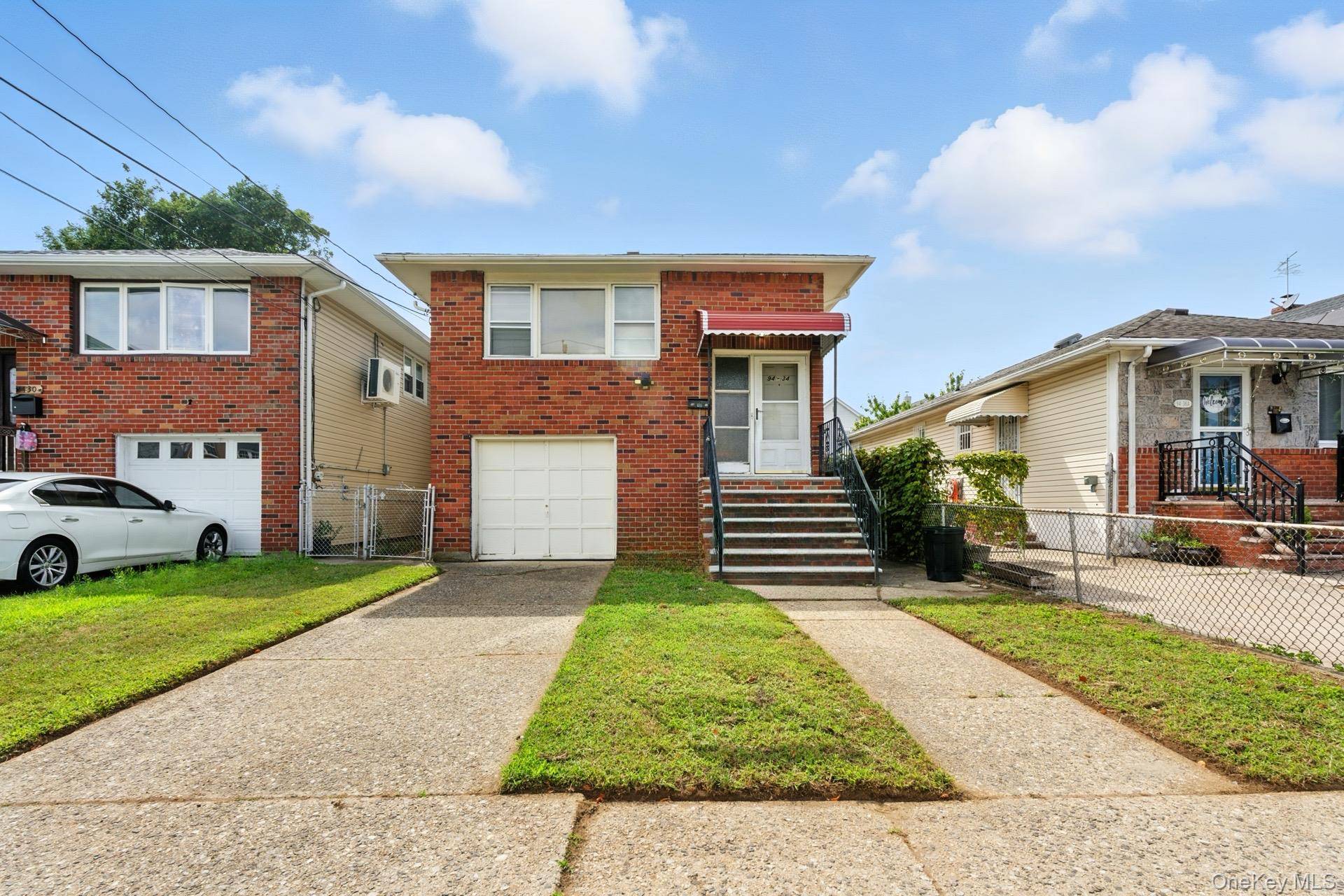 Welcome to this charming one family home located on the Nassau side of Bellerose Terrace.