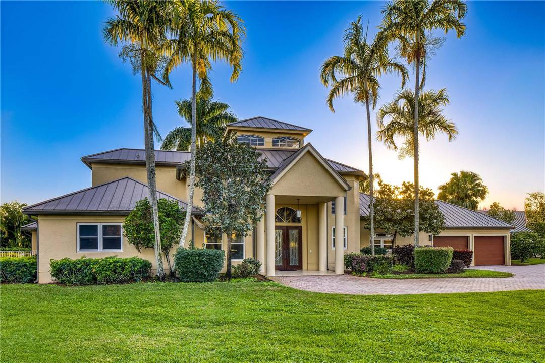 A rare opportunity in the heart of Palm Beach Gardens no HOA and perfectly positioned on a quiet cul de sac with sweeping views overlooking the tee box of the ...