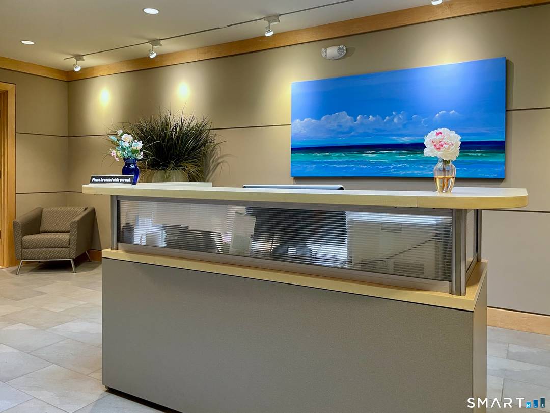 Top tier co working office facility featuring shared kitchen and conference room amenities.