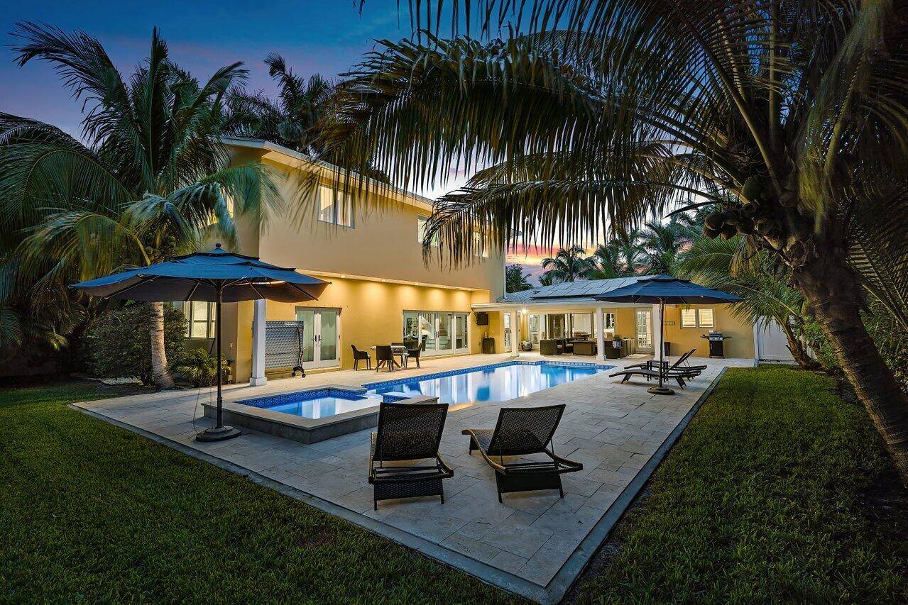 Spacious family home ideally located in the heart of the sought after Lake Ida neighborhood of Delray Beach.