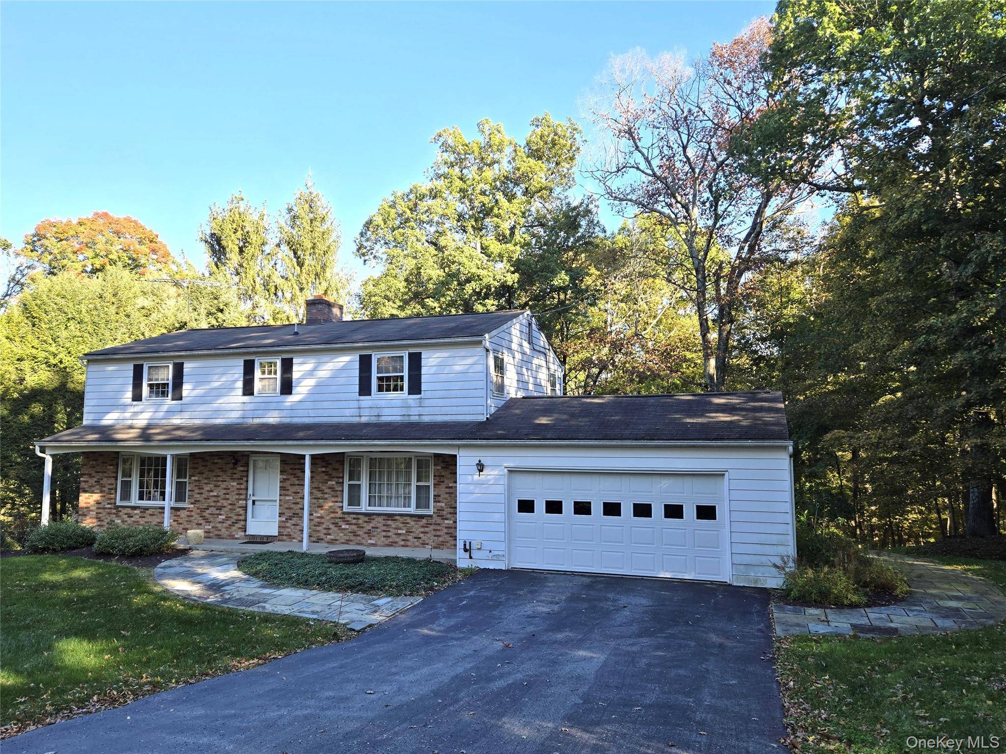 Welcome to this charming colonial home located in the highly sought after neighborhood of Taconic Estates !
