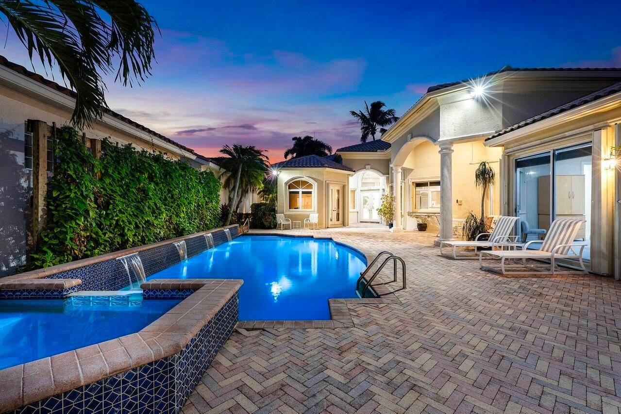 Photos include remodel concept renderings Situated on a premium lot in the Isles at Hunters Run, this enchanting 4BR courtyard presents a private paradise that delights at every turn.