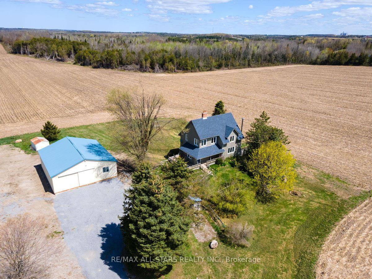 Serene and peaceful location backing to farmland, 3 bedroom, 2 storey, board and batten farmhouse ; updated refreshed kitchen with apron sink, large walk in pantry and centre island open ...