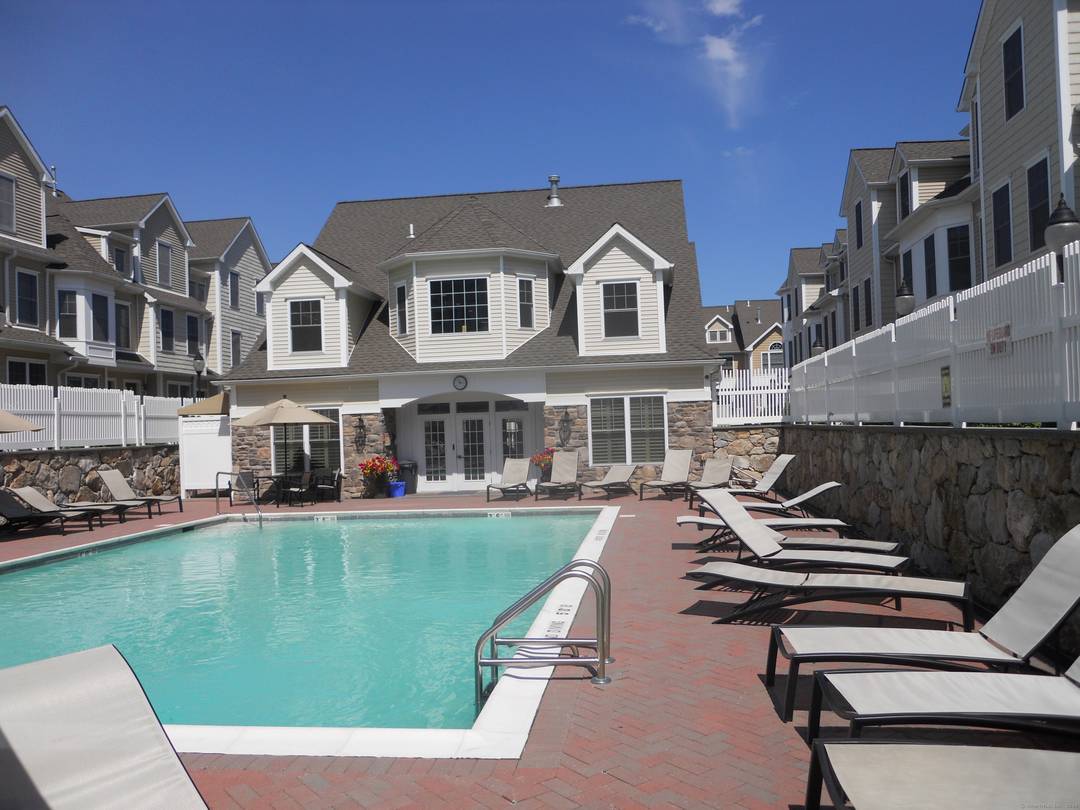 Welcome to 85 Camp Ave in Stamford, CT, a bright and well maintained tri level townhouse located in the highly desirable Springdale neighborhood.
