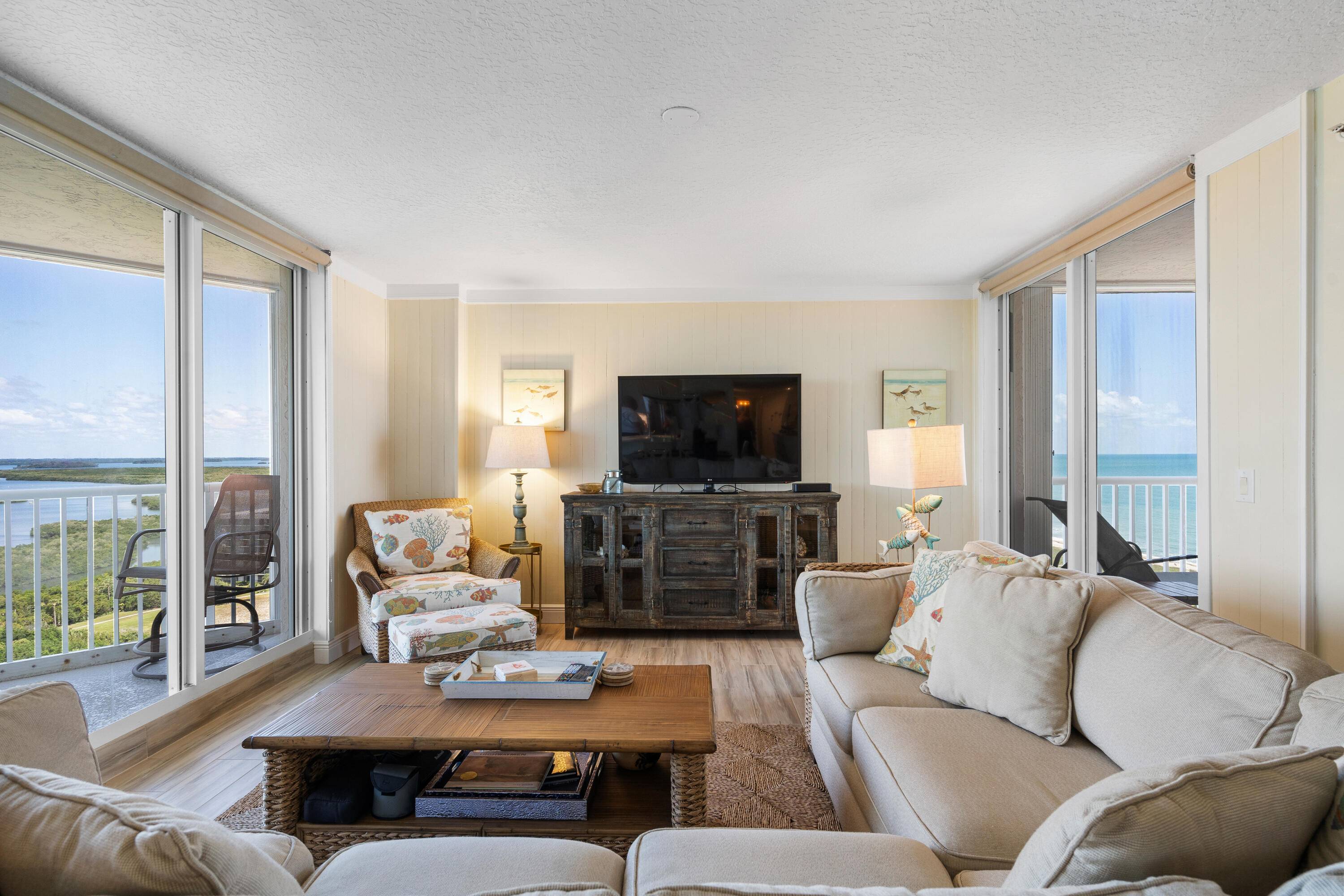 Beautifully updated 3 bed, 2 bath corner unit with stunning, panoramic ocean and intracoastal views !