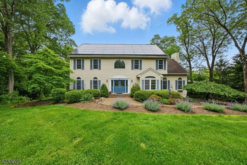 Situated on a beautifully landscaped cul de sac in Boonton Township, this captivating 4 bedroom, 3.