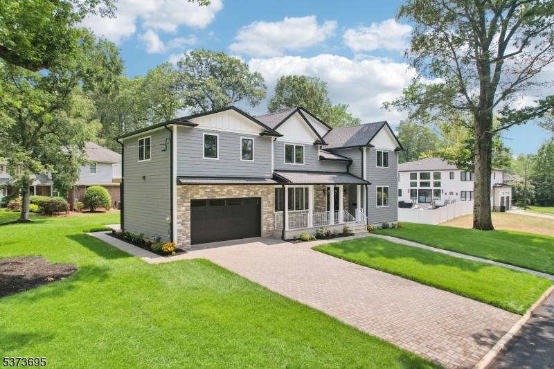 Spectacular new construction on existing footprint in Oradell's highly desirable Latchstring section.