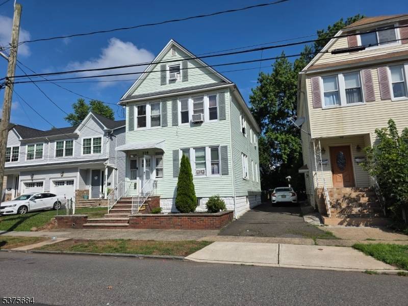Excellent opportunity to own a well maintained two family home in the heart of Linden.