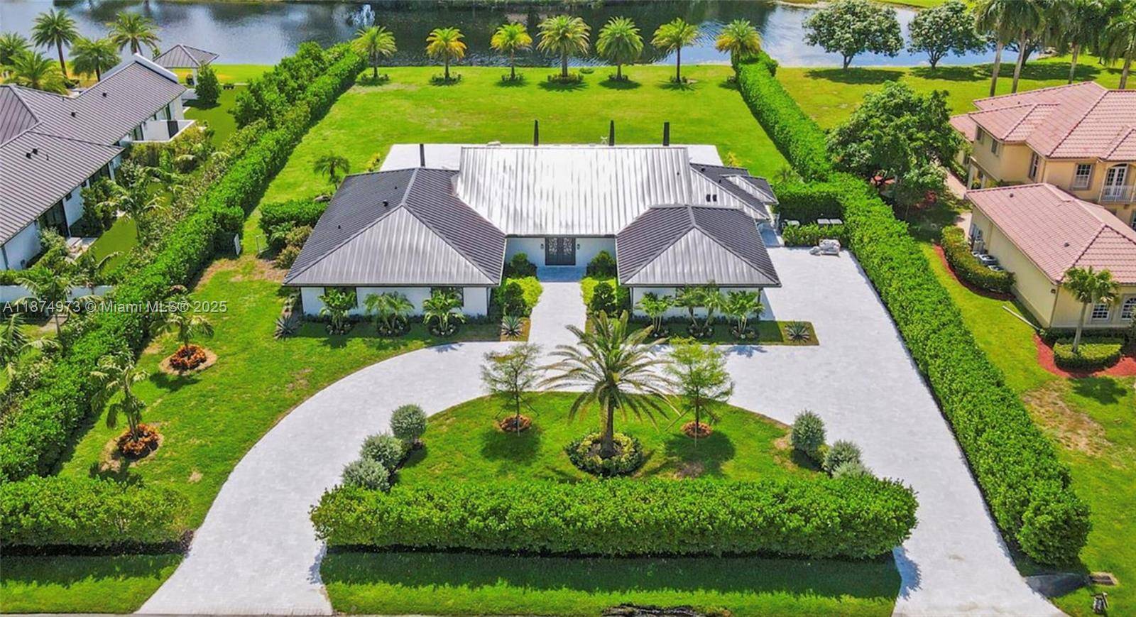 Completely Remodeled Lakefront Estate in Prestigious Fieldbrook Estates, One of only 54 homes in this private, gated exclusive community.