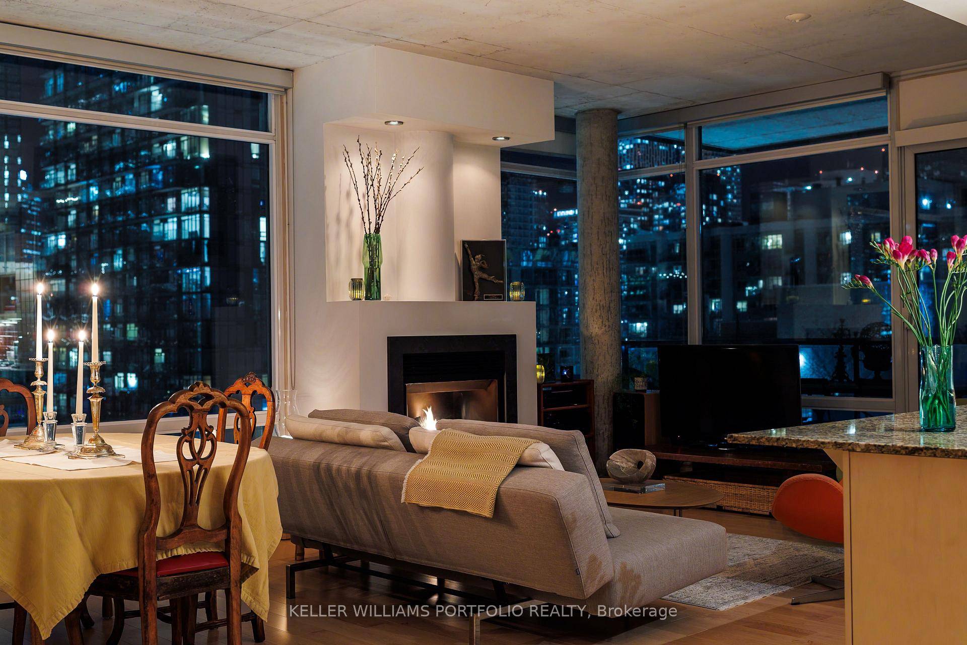 1149 sqft of Hip, cool, warm, relaxing, private, and quiet for high end living and entertaining describe this two bedroom plus den corner condo suite.