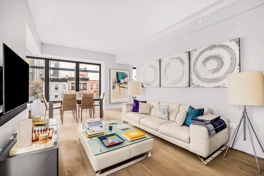 This stunning 1, 564 square foot corner residence at 301 East 50th Street offers an exceptional two bedroom, two and a half bath layout with beautifully proportioned interiors and refined ...