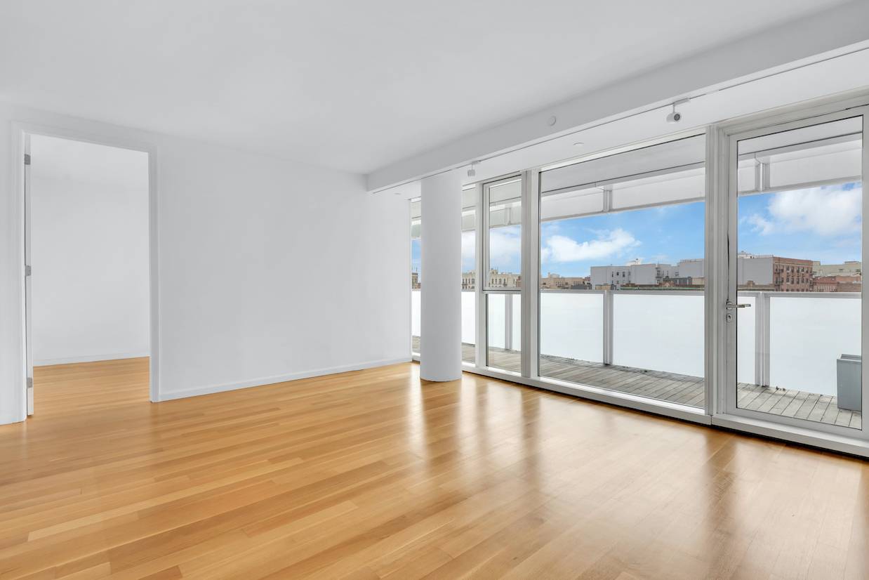 Beautiful split 2 bedroom 2 bathroom located in the iconic Richard Meier Building on Prospect Park at 1 Grand Army Plaza.