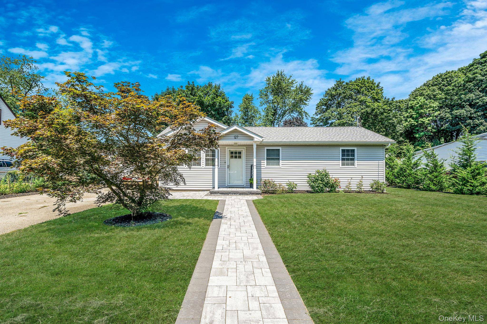 Experience modern luxury in this stunning remodeled 3 bedroom, 1 bath ranch nestled on a beautifully manicured.