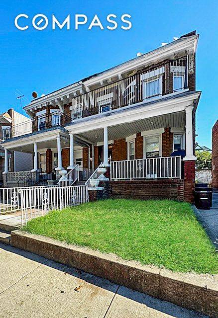 Large, brick, two family semi attached home located in Kensington offering endless possibilities !