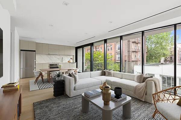 Situated within the vibrant landscape of Greenpoint, apartment 3B at 153 Green stands as a testament to modern design seamlessly woven into its surroundings.