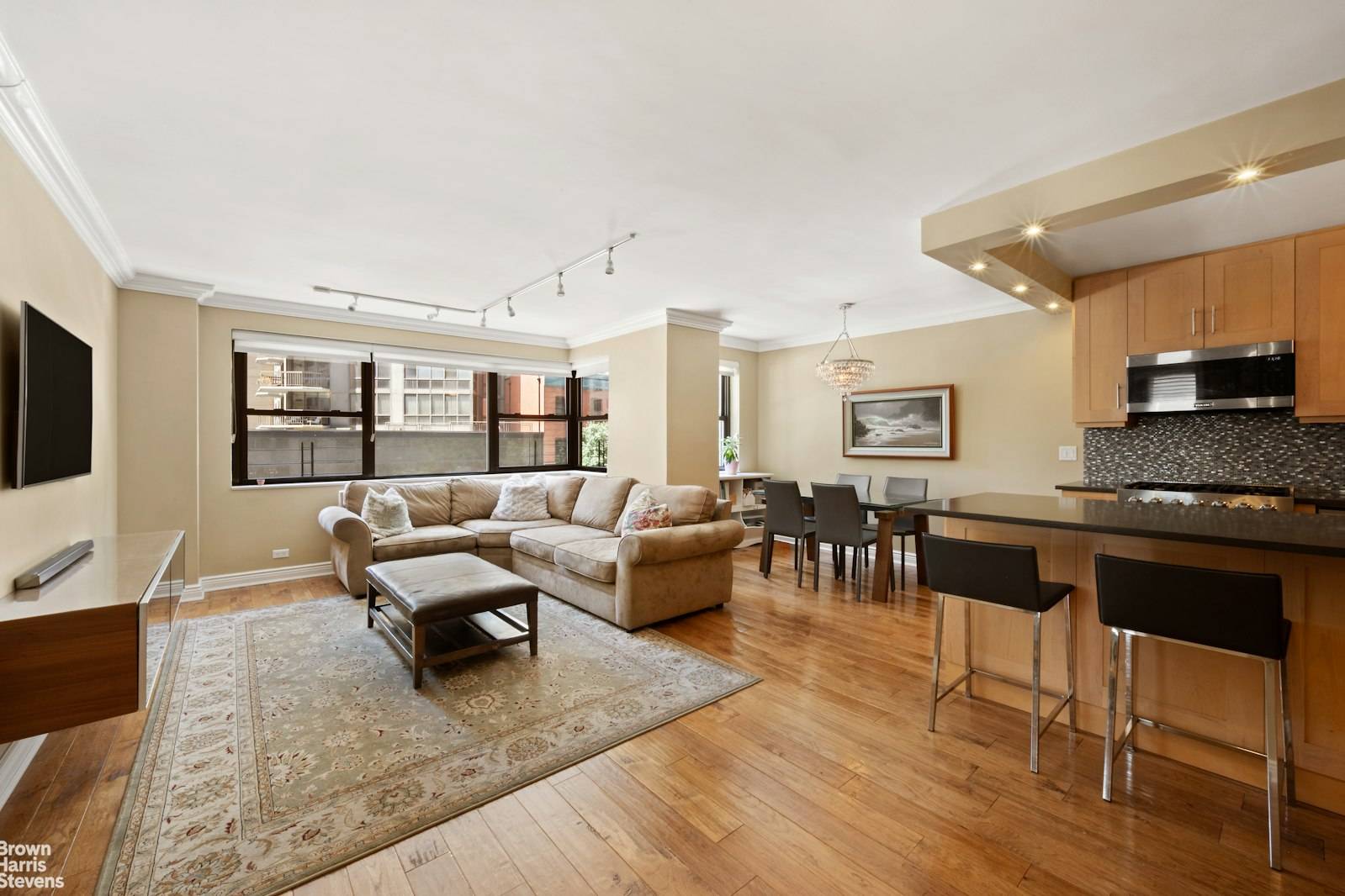 MOVE RIGHT INTO THIS CORNER RESIDENCE !
