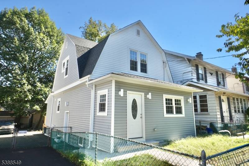 Welcome to this beautifully renovated Colonial featuring an open concept design.