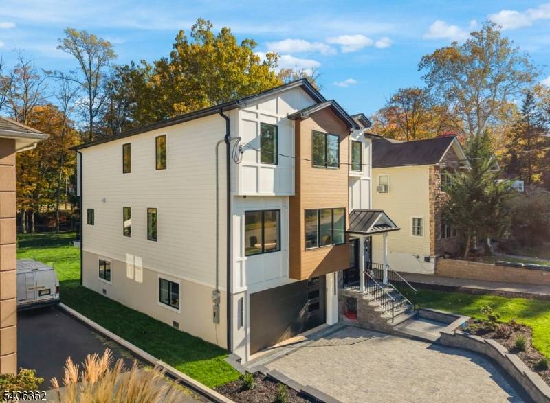 Welcome to this thoughtfully designed new construction featuring a finished ground level ideal for entertaining, plus a serene second floor retreat.