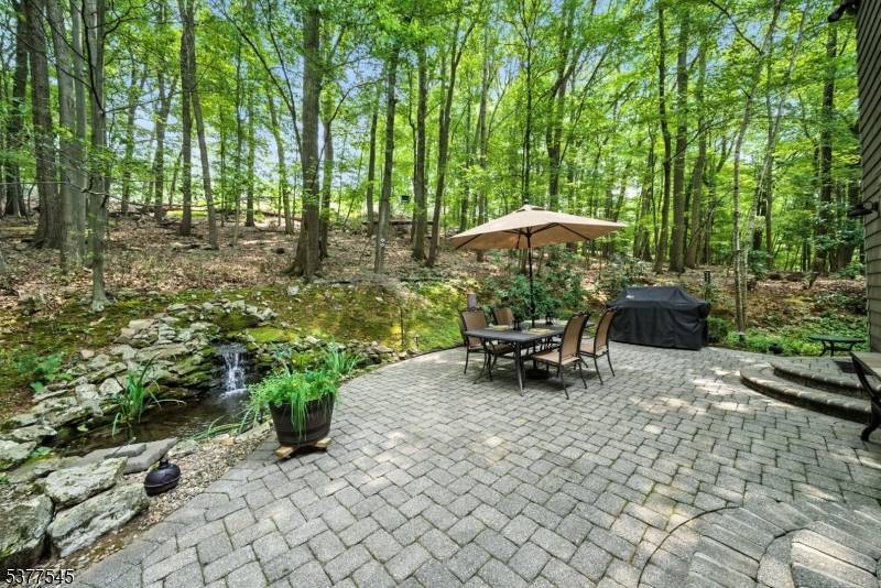 This Spectacular Beautifully Appointed Center Hall Colonial is nestled in the desirable Union Hill Section of Denville amidst a private, beautiful tree line.