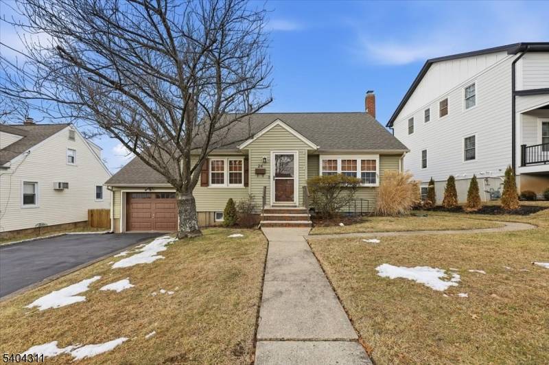 Welcome to this charming cape cod, which offers a classic layout.