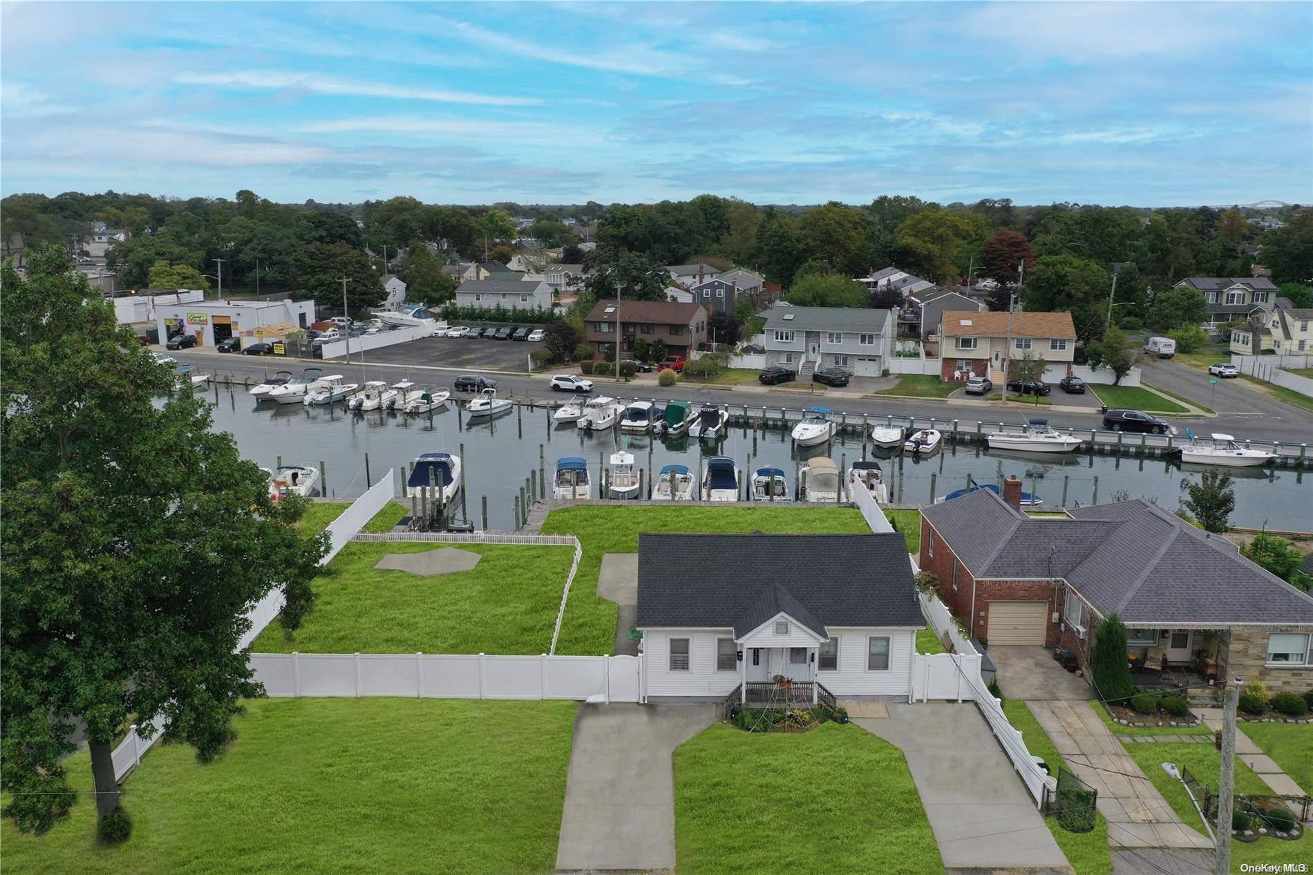 Discover this waterfront ranch, perfectly positioned for both comfort and investment.