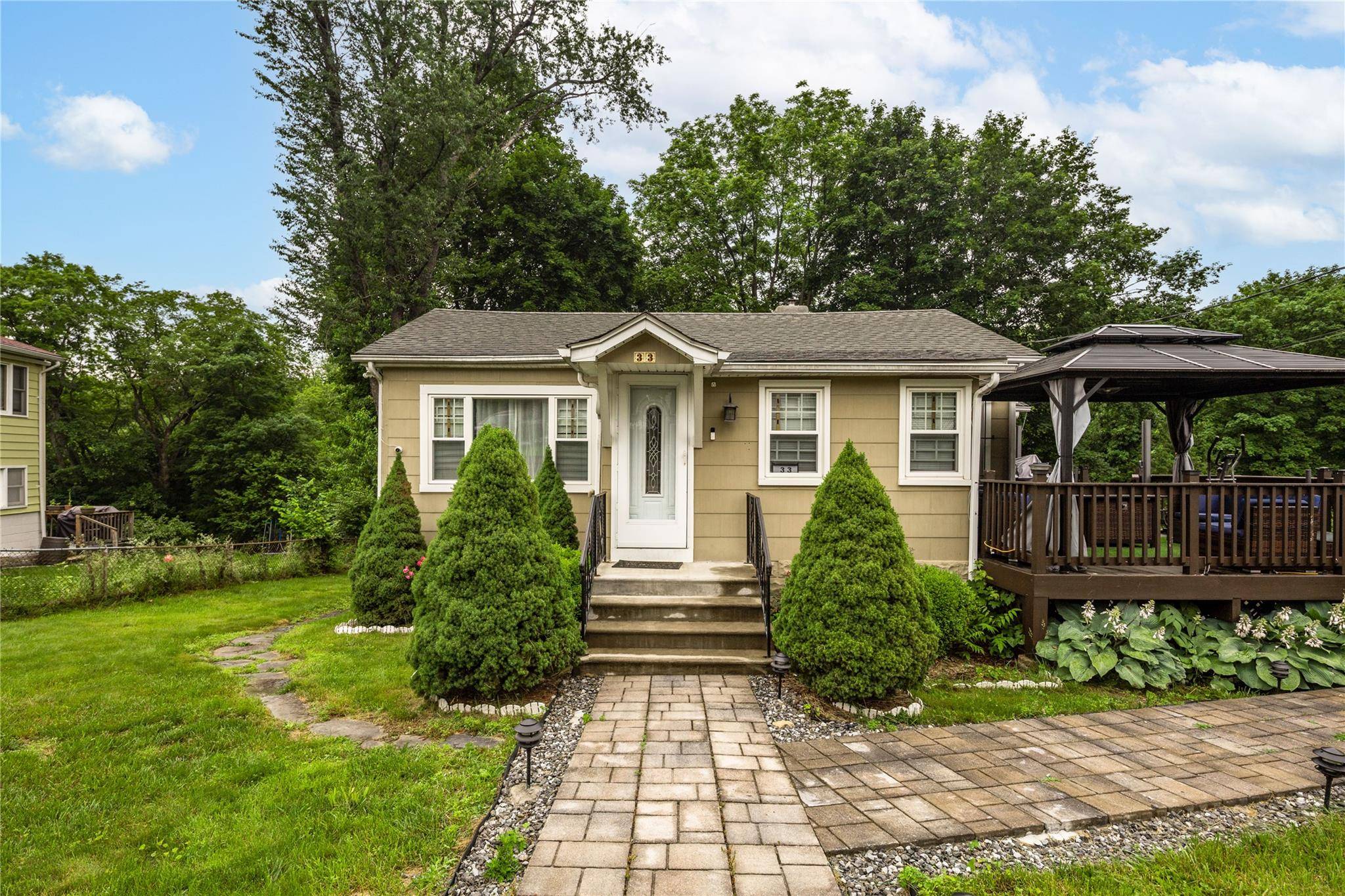 Well maintained and recently updated home set on lovely usable property affording privacy in the rear.
