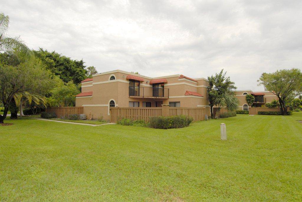 AFFORDABLE and SPACIOUS 3 BED 3 BATH townhome in BOCA RATON with a LARGE FRONT PORCH great for grilling enjoying the outdoors.