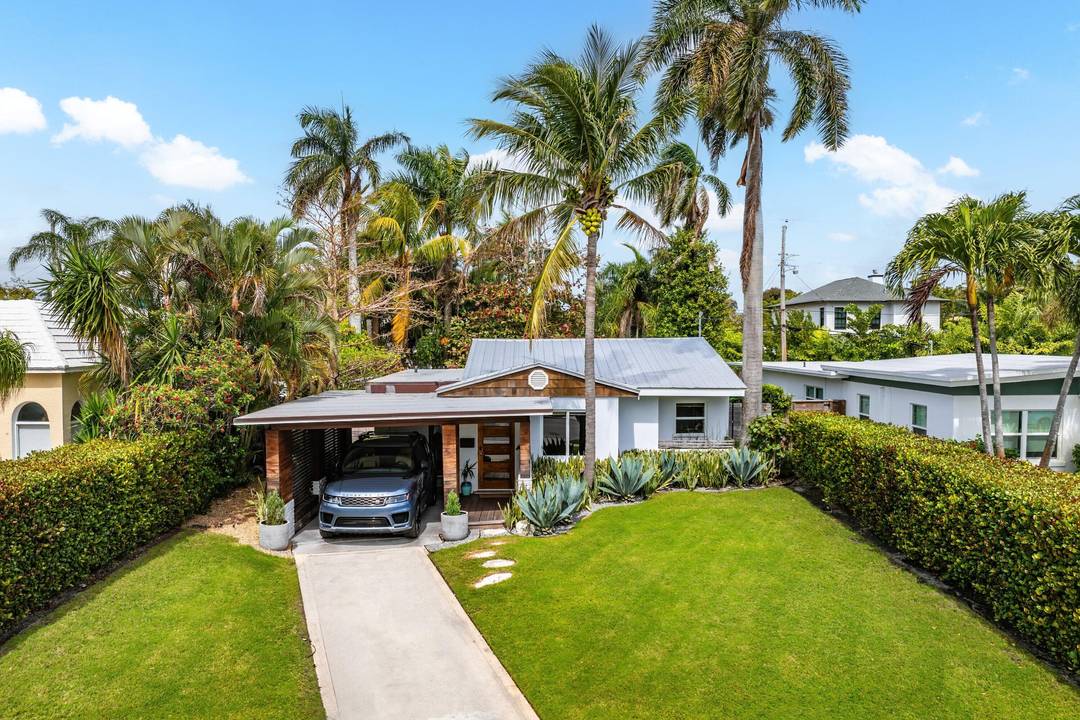 Modern Tropical Bungalow moments away from the Intracoastal Waterway in the coveted Northwood Shores.