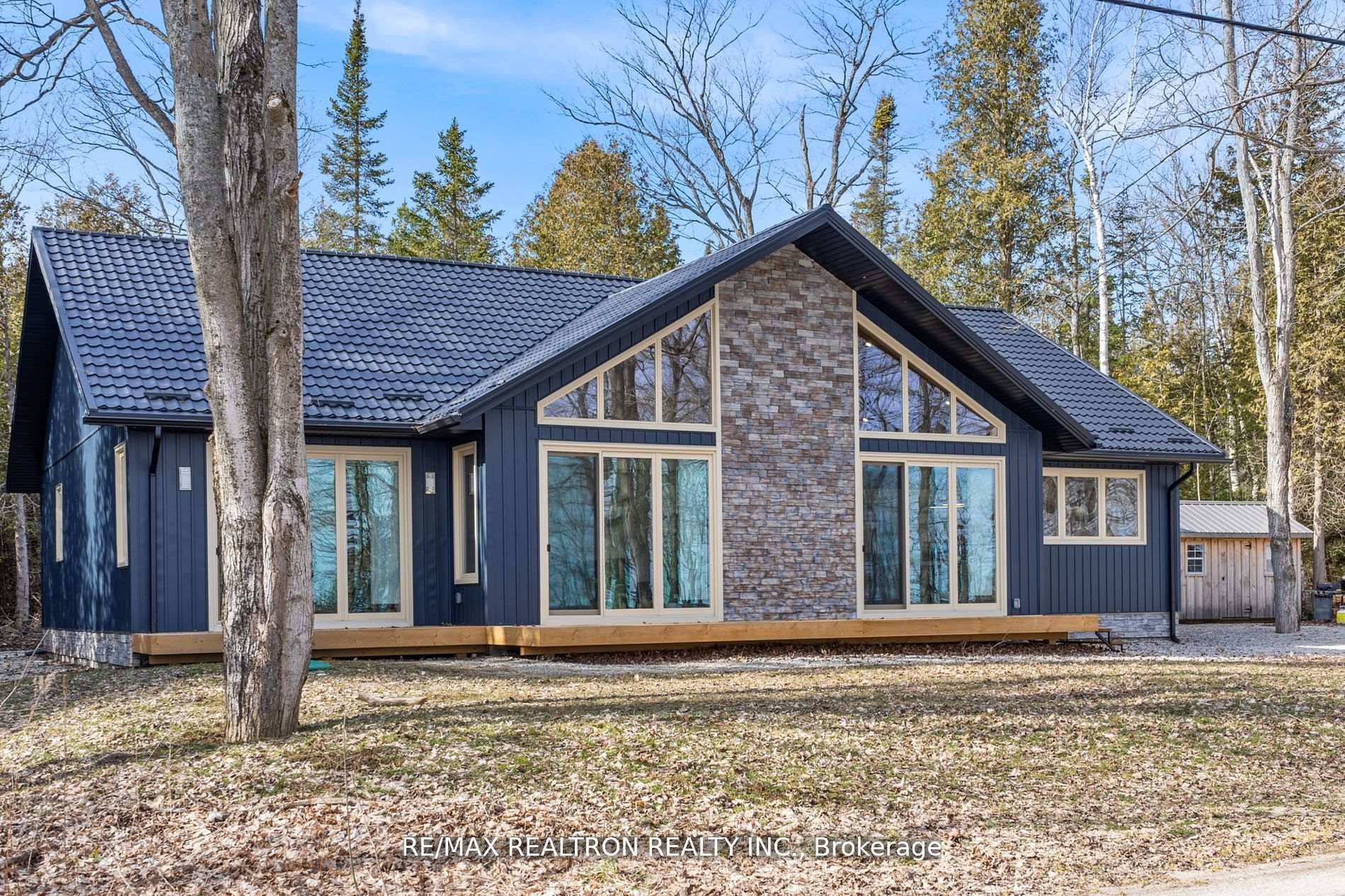 Introducing A One Of A Kind Custom Built Bungalow Featuring 4 Bedrooms And 3 Bathrooms, Offering Breathtaking Views Of the Majestic Georgian Bay.