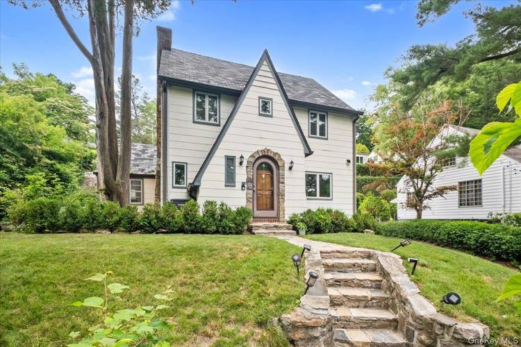 A wonderful Greenacres home with versatile living space and abundant light in a very convenient location.