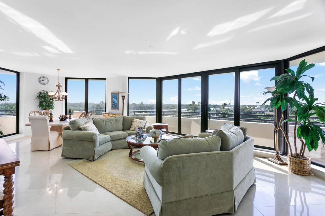 Spacious, newly refreshed, rare 3 BR, 3 BA, light filled high rise condo in Jonathans Landing, one of Jupiter's premier private club communities.