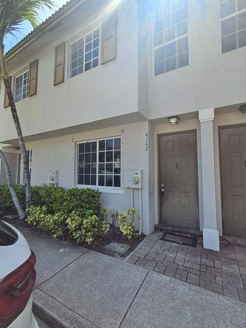 Arbor Parc Mediterranea is a GATED Community in a desirable location on Military Trail.