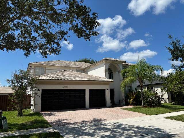 Bright and beautiful home in the exclusive Pembroke Lakes community.