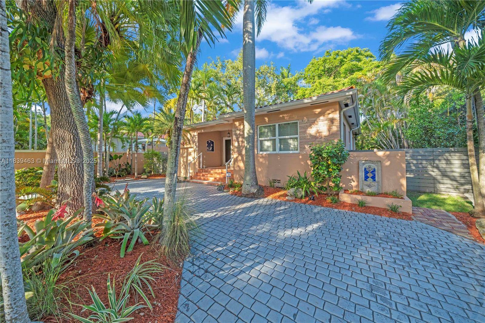 Welcome to this warm and inviting 2 bedroom, 2 bathroom home nestled on a lush 6, 599 sq ft lot in the highly desirable Coconut Grove.