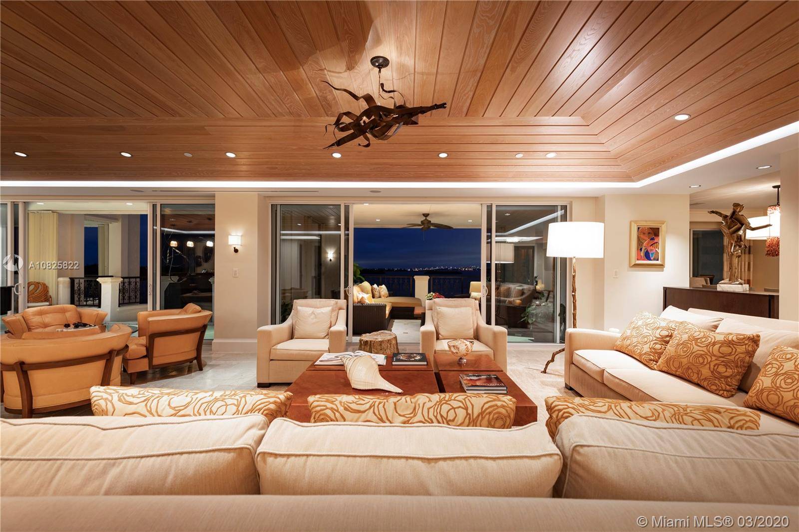 Sunsets, twilights mesmerizing moons captivate the senses in this perfectly renovated 6700sf high floor unit on Fisher Island.