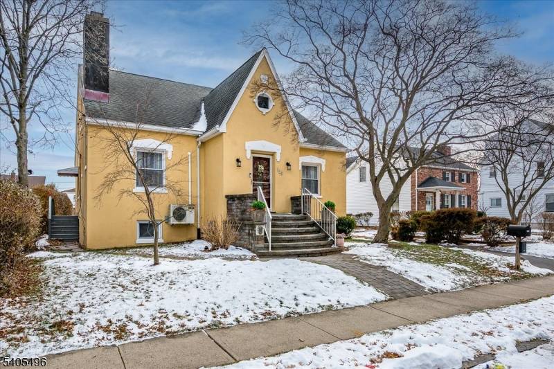 Well maintained two family on a spacious double lot offering hardwood floors, fireplaces and separate units.