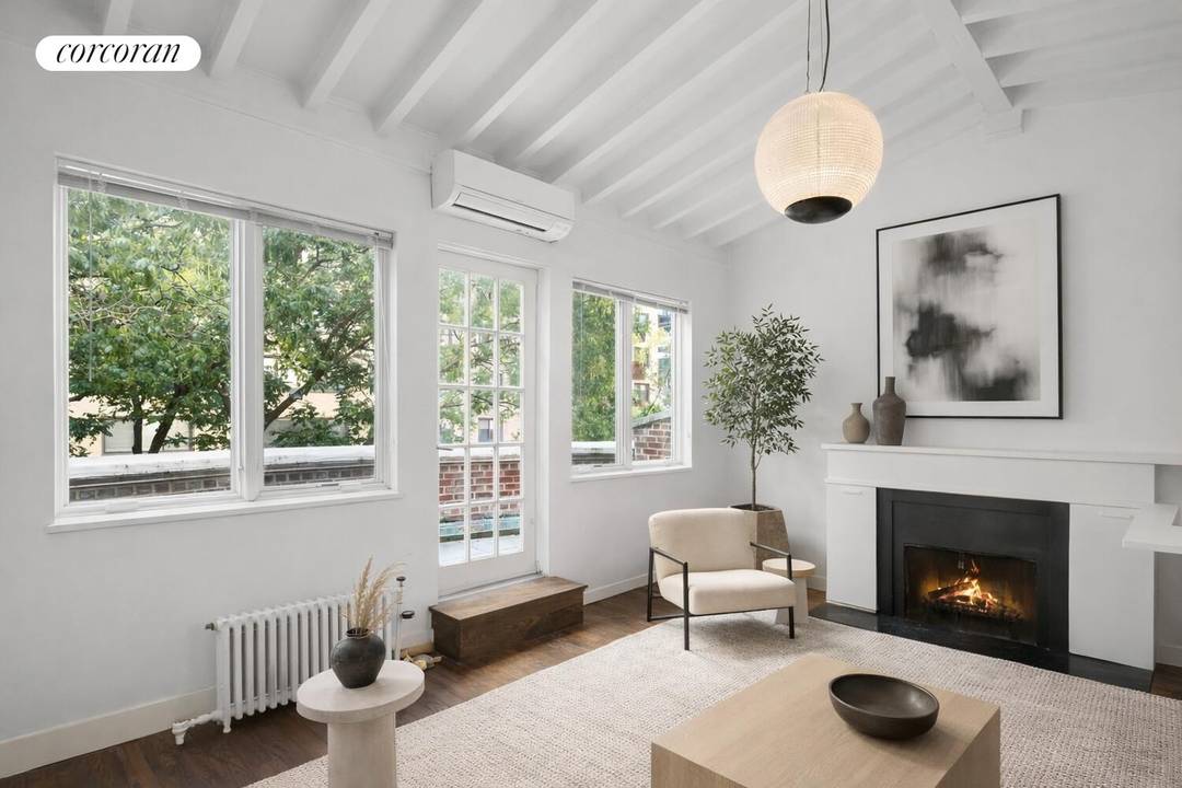 A Rare Front Terrace Residence in the Heart of Downtown Perched within a classic elevator brownstone, this exceptional one bedroom home offers a truly rare and coveted feature an expansive, ...