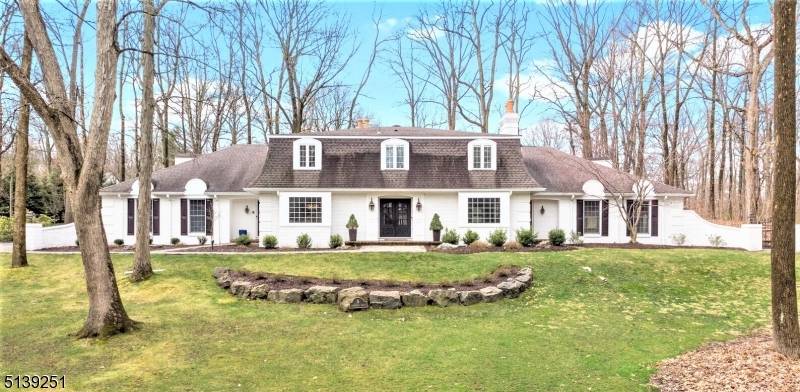 European Architect inspired Gracious custom home with beautiful heated SALT WATER INDOOR POOL, has been updated and renovated with young supplicated modern taste, Stylish handsome double door leads to wonderful ...