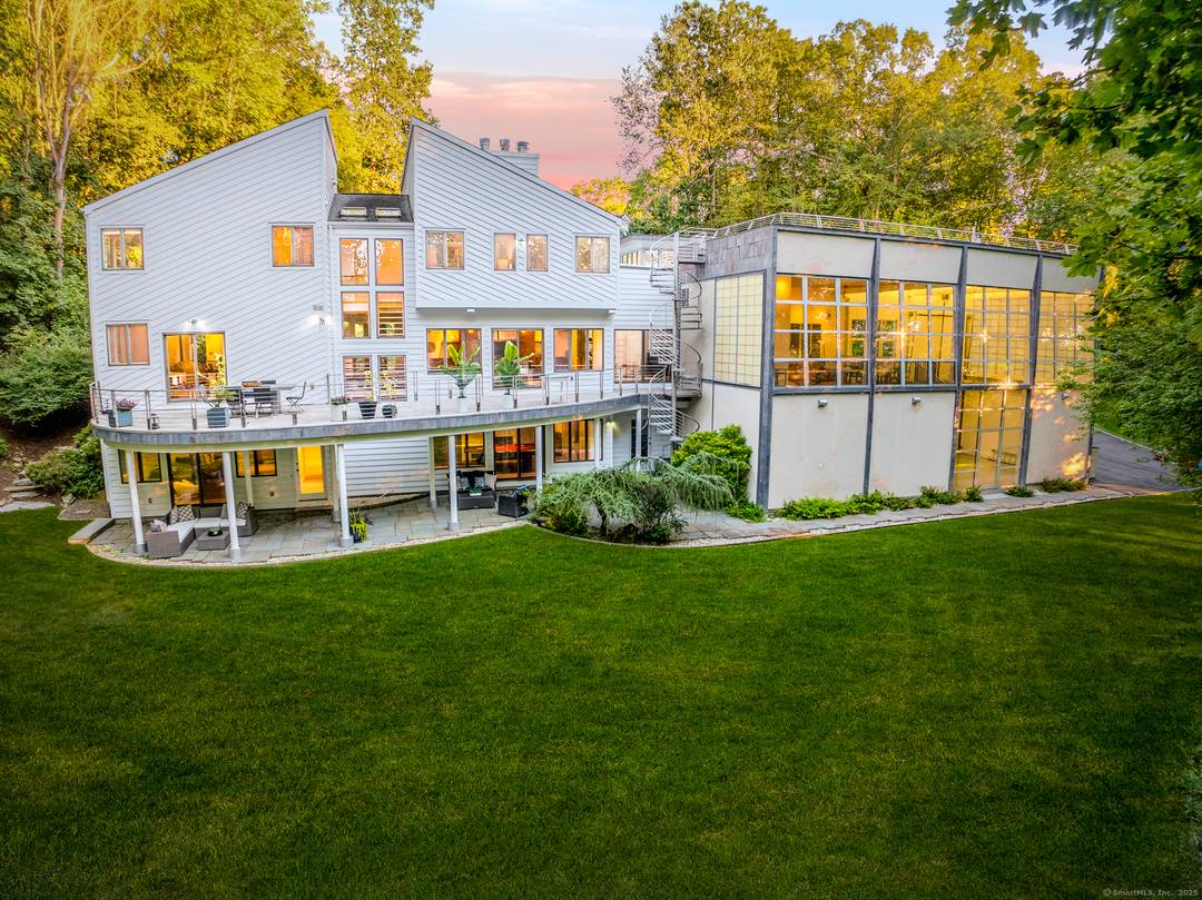 Discover this stunning 6 bedroom single family home a modern masterpiece designed for today's lifestyle.