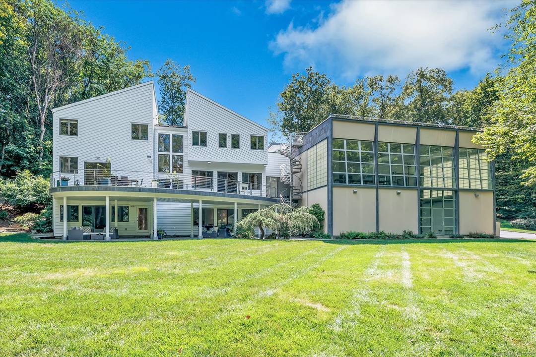 Discover this stunning 6 bedroom single family home a modern masterpiece designed for today's lifestyle.