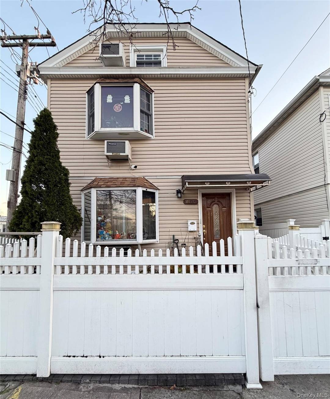Welcome to this charming 2 family home in College Point.