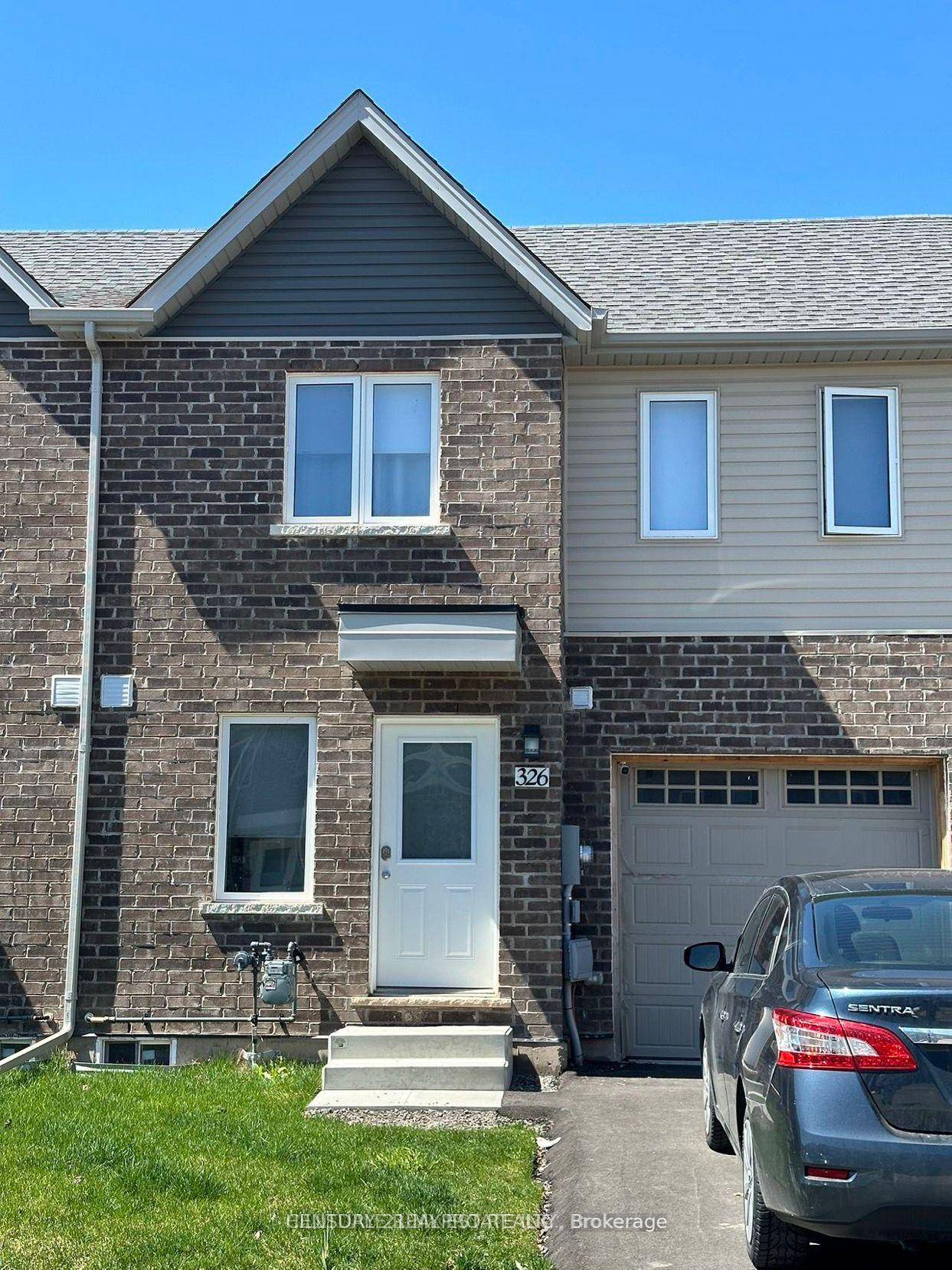 Experience the best of both worlds in this unique bungalow style townhouse, bathed in an abundance of natural light !